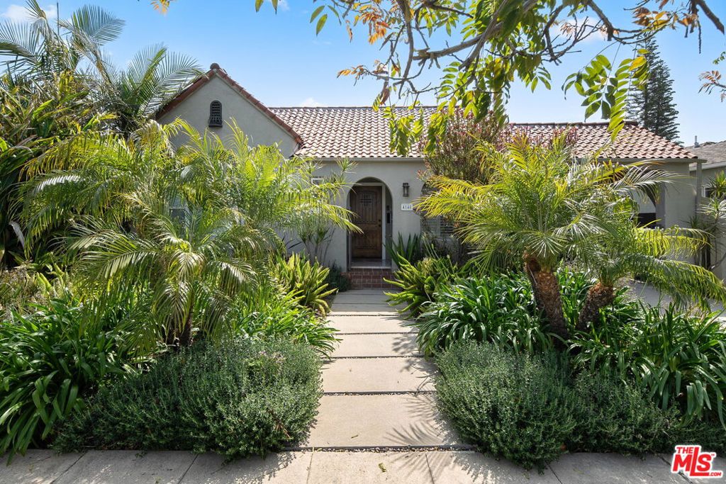 Welcome to 4146 Chase Ave a beautifully updated Spanish-style home nestled in the heart of Culver West. This meticulously maintained 3-bedroom, 2-bath main residence seamlessly blends classic charm with thoughtful modern updates, offering warmth, functionality, and timeless design. Step inside and be greeted by soaring vaulted ceilings, a cozy fireplace, and an inviting living room bathed in natural light. The open-concept kitchen is a chef's dream, featuring shaker cabinets, sleek countertops, a farmhouse sink, and designer fixtures, all flowing effortlessly into the dining space perfect for entertaining or everyday living. The spacious primary suite offers serene backyard views and direct access to a lush, private garden retreat, ideal for quiet mornings or weekend gatherings. The two additional bedrooms are bright and versatile, perfect for family, guests, or a home office. Tucked away in the back, the newly built ADU is a standout feature complete with its own bedroom, full bathroom, fully-equipped kitchen, and separate entrance. Whether used as a guest house or home office, the possibilities are endless. Outdoor living shines with multiple lounging areas, a pergola-covered deck, and a grassy yard surrounded by vibrant landscaping and mature trees. Located on a peaceful, tree-lined street in one of the Westside's most coveted neighborhoods, you're just minutes from Venice, Culver City, Mar Vista and the best of Silicon Beach.