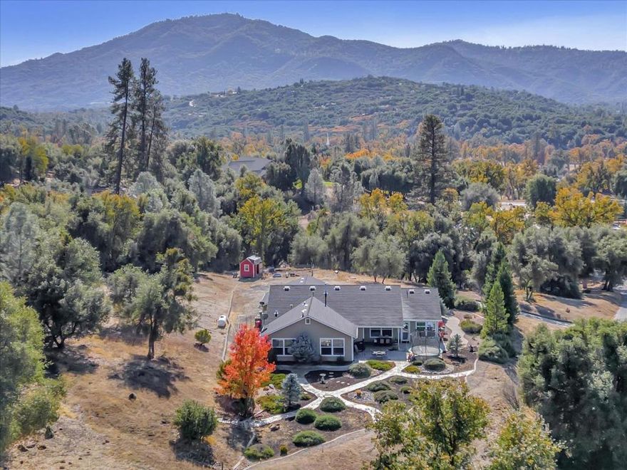 Enjoy all four seasons in this executive home located in Sierra Meadows. This 4-bedroom, 3 full bath home sits on over 2 acres surrounded by majestic mountains and ponds in a town with over a century of history. Fully landscaped with multiple patio areas and flagstone walkways, youll never get tired of the views. With 2,622 square feet of living space with tile and luxury plank wood flooring, formal living and dining room, separate living space with an open kitchen floor plan. Youll enjoy the vas local amenities from wine trails, golf, hiking, fishing, horseback riding, and a short drive to Yosemite National Park, or enjoy an evening out at Chukchansi Resort & Casino.
