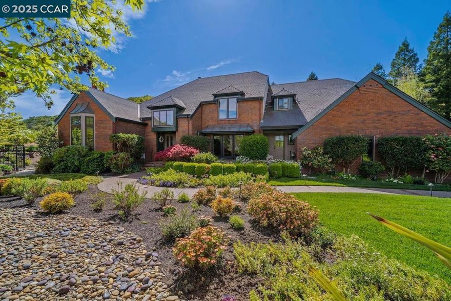 New Price!  One of Moraga’s premier estates, this 4,791± sq. ft. Branagh-built residence blends timeless architectural charm with luxurious modern updates. Privately set on a .67-acre lot surrounded by lush landscaping, mature trees, and rolling hills, the home offers unmatched privacy while remaining close to top-rated schools, parks, and community amenities.  Inside, a thoughtfully designed floor plan features four spacious bedrooms plus a den and 4.5 bathrooms. The grand entry leads to sunlit living spaces with soaring ceilings, custom millwork, and oversized windows framing serene garden views. Multiple gathering areas — from the formal living room to the inviting family room — create a seamless flow for entertaining and everyday living.  The gourmet kitchen boasts high-end appliances, expansive countertops, and ample storage, w/ a breakfast nook & formal dining room ideal for hosting. The luxurious primary suite offers spa-like amenities, tranquil views, and direct access to landscaped grounds.  The resort-style living awaits with a sparkling pool and spa, stone patios, curated gardens, and secluded seating areas — all set against sweeping views of Moraga’s hillsides. Located in gated Sanders Ranch, this estate perfectly balances natural beauty, privacy, and lifestyle.