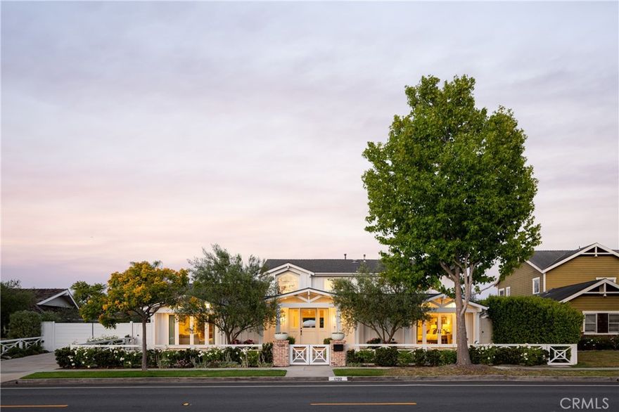 Welcome to 1700 Highland Drive—a stunning, upgraded residence in the heart of Newport Beach’s sought-after Dover Shores. This luxurious 5-bedroom, 6.5-bathroom home spans over 5,100 square feet on a 10,230 square foot lot, offering a perfect blend of elegance, comfort, and coastal convenience. Thoughtful recent upgrades include a redesigned kitchen backsplash, freshly repainted cabinetry, and a newly added living room/office with French doors. The laundry room has been reimagined with new floors, cabinetry, and French doors that lead to the pickleball court. A reconfigured movie room, retiled pool, and a newly added sectioned brick wall in the backyard further elevate the home’s functionality and style. The open-concept layout showcases a spacious great room with infinity doors that flow into an entertainer’s dream backyard—complete with a private pool with Baja shelf, spa, built-in seating, gas fire pit, and pickleball court. The chef’s kitchen features a six-burner stove, double ovens, Calcutta countertops, Miele espresso built-in, walk-in pantry, and custom cabinetry. The serene primary suite offers a walk-in closet, barn door, and spa-style bath with dual vanities, Calcutta gold marble, soaking tub, and oversized shower. One bedroom and four bathrooms are located on the main level, along with a den, office, and laundry room. Smart home systems, zoned HVAC, Elan surround sound, EV charging, reclaimed wood accents, security cameras, and a gated 40-foot driveway complete this exceptional offering—just minutes from the Back Bay loop, beaches, top schools, and 17th Street dining.