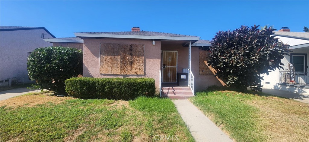 Investor Special! 3-bedroom, 1-bath home in the heart of a pride-of-ownership neighborhood in Compton offers a great investment opportunity. The house has sustained minor fire damage but no red tags have been issued by the City of Compton, indicating it is safe for renovation. The property features a two-car garage with an existing bathroom that may be eligible for conversion into an ADU—buyer to verify with the city regarding legality. Located in a prime area with solid equity built in, this home is ideal for an investor seeking a fix-and-flip project. The seller is looking for a quick, non-contingent close and will not consider any "and/or" or assignee offers. Don't miss this opportunity to unlock the potential of this well-positioned property in a desirable street. Cash or hard money only.