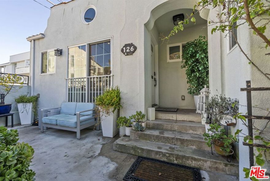 Welcome to this glamorous, fully renovated beach bungalow, just a stone's throw from the sun-kissed shore and conveniently situated near the lively entertainment and dining scene of Washington Street. This exquisite one-bedroom, one-bathroom features soaring 10-foot ceilings filling the space with natural light and creating an airy, elevated feel. The interior is thoughtfully updated with high-end finishes, including stainless steel appliances and an in-unit washer/dryer. The bathroom features a spacious 5' jacuzzi tub complemented by a handheld shower. Step outside to the gated courtyard with keyless entry and an Arlo camera system for added peace of mind. Reserved, parking available for an additional $200/month for added convenience. You're minutes from the beach, Marina del Rey's best dining and nightlife, and a quick drive to LAX, Venice, Santa Monica -  It's the ideal blend of convenience, comfort, and California coastal living.