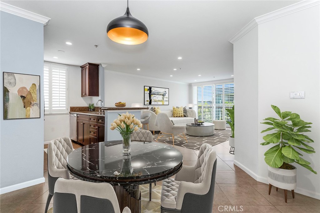 CHECK OUT THIS PRICE!!!! LUXURY LA LIVING MEETS SMART INVESTMENT IN THE HOLLYWOOD REGIS!!! This spacious 1-bedroom, 1-bath condo offers style, value, and a prime Hollywood location! The light-filled living room features a fireplace, recessed lighting, and floor-to-ceiling sliding glass doors with pretty plantation shutters, that open to a huge private balcony with views of trees, the neighborhood and Hollywood Hills. The balcony is perfect for your morning coffee or a glass of wine to relax with friends. The kitchen features granite countertops, stainless steel appliances, and a window that also has plantation shutters. There is a long counter where bar stools could be added for additional seating. The dining area is nicely sized and convenient to the kitchen for entertaining. The bright and spacious bedroom suite includes a walk-in closet, wood-look laminate flooring, a separate dressing area, and a modern bath with tub and glass-enclosed shower.
Extras include an in-unit laundry, 2 assigned gated tandem garage parking spaces for this one bedroom unit, and a private storage unit in the garage—a rare bonus that comes with it! Enjoy resort-style amenities conveniently on the same floor as the unit: a heated pool & spa with cabanas, and an on-site gym to maintain your fitness. There are EV charging stations throughout the garage, also guest parking in the garage, an on-site (M-F) property manager, all in a controlled security access building! HOA covers water and trash. The complex is pet friendly, too! The unit sits in the corner, and is super quiet. There's a door near the unit that leads to the garage for convenient access and to walk a pet.
The Hollywood Regis is situated near the Iconic Sunset Strip, just minutes from Runyon Canyon for hiking, access to coffee shops, boutique shopping, grocery stores, and LA’s finest restaurants and nightlife! It's also a fantastic walking neighborhood!
Don’t miss a gem like this unit, that sits in a vibrant urban neighborhood that has so much more to offer! It's perfect for people seeking the excitement and convenience of city living at an unbelievable price! This is the one! Come see it soon! (Furnished areas are virtually staged.)