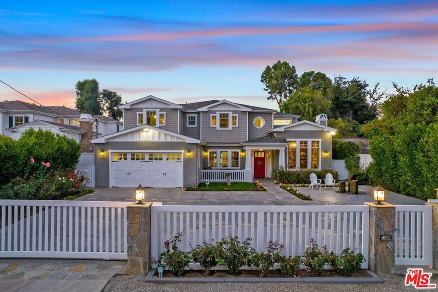 Experience the incredible scale, grand spaces, and dramatic feeling of this unique 2 story residence, located on probably the most sought after street in the Colfax Meadows neighborhood.  An expansive floor plan featuring over 6,000 square feet of living space on an oversized 15,775 square foot lot - this rare offering is perfect for even the most discerning clientele. An immaculate and truly remarkable gated home - boasting 5 en-suite bedrooms, 6 baths, plus an additional home office suite and massive home theater. This home truly has just about every conceivable amenity and luxury one could desire including a Control 4 smart system, security cameras, and an aqua link wireless remote to operate the saltwater pool and spa with brand new pool heater. The residence is complete with soaring high ceilings, open floor plan, incredible indoor/outdoor flow, and style galore. Enter through 2 secured electric gates to a gorgeous and private front courtyard with 5 car motor court, oversized 2 car garage and circular driveway. The cooks kitchen has Ceasar stone countertops, 2 dishwashers, 2 sinks and a huge double sized Calacutta center island with attached Ice-maker and  Stainless steel Viking appliances and a Subzero refrigerator and 2 extra refrigeration drawers for extra food storage for BBQs and parties, overlooking the breakfast area and family room that opens through bi-fold doors to the patios, separate gazebo with fireplace, TV hookup, BBQ, outside sink, refrigerator and serving bar, all near the pool and sunbathing areas. Outside in this magnificent Southern California weather, experience the sparkling pool and spa, and outdoor lounge and dining space that can only be afforded with this oversized lot. Massive yet cozy and inviting home theatre featuring a Sony projector with 8 large reclining chairs and space for more seating. Separate temperature and security controlled wine storage area. Take the PVE-52 elevator or stairs to a truly magnificent master bedroom suite featuring double door entry, 2 walk-in closets and an immaculate master bathroom with two separate hand basins and a large glass steam shower, all with views of the private yard and pool area. Additional features of the home include an exceptionally quiet, art deco, transparent pneumatic vacuum elevator, operating entirely without cables or pulleys, surround sound system and ceiling speakers in media room, family room, hallways and master suite. Close to fine dining and shopping, and located in the very desirable Carpenter School District. This home truly must be seen to be believed.