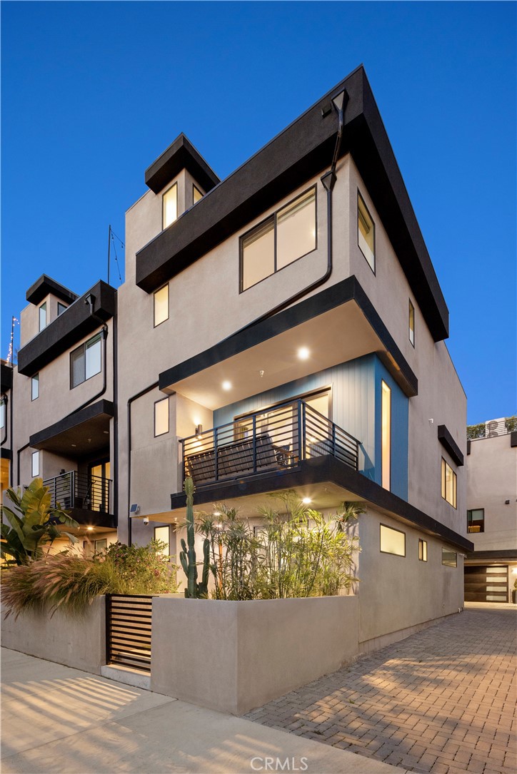 It's ROOF TOP SEASON - Sleek spacious corner unit is the sexy smart space you need in Melrose Hill, Los Angeles! This turnkey new construction is a perfect lock and go or pied-à-terre, not restricted by short term rentals: live, work, and rent/timeshare. Three bedrooms with en-suite bathrooms, plus powder room on level two; four levels culminate at rooftop terrace with epic view of the HOLLYWOOD sign. Two car garage includes overhead bike racks, second fridge, and car charger. Inside storage provides shelving, media closet, appliance depot (with additional electrical outlets) + custom closets close to Paramount Pictures, Netflix Headquarters, and Raleigh Studios. Sunset says, "This is L.A.'s Hottest Neighborhood Right Now." You can't beat the square footage, upgrades, and prime location. This sumptuous spot, intersected by Melrose, is home to Italian eatery Ètra, cool coffee shop Café Telgrama, chic L.A. Grocery and Café, and Filipino spot, Kuya Lord (Best Chef In California from the James Beard Foundation) is why Eater wrote, "How Melrose Hill Became LA’s Hottest Culinary Boom Town." Shop at Pop Up Home, have a splash at Bar Etoile, and explore global gallerist David Zwirner just steps away. Near Metro, Cinespia at Hollywood Forever (viewing iconic films), and Larchmont Village Farmers Market; Hancock Park adjacent. Calling all culture vultures - this is your sign to come check out this luxury loft like single family home on an ultra tiny lot in a premium position with three exposures for all the light. Also available for sale: $1,475,000.