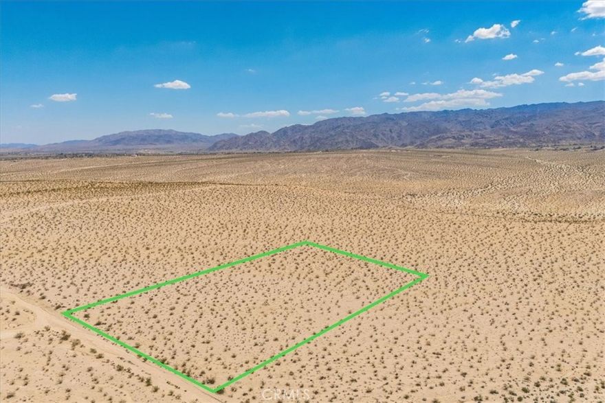 Discover the allure of desert living with this expansive 5-acre parcel in Twentynine Palms' sought-after Desert Heights neighborhood. Embrace the tranquility of wide-open spaces and breathtaking views that stretch to the horizon. This prime piece of land is your gateway to a lifestyle rich in adventure and natural beauty.

Just a short drive away, you'll find the majestic Joshua Tree National Park, offering endless opportunities for hiking, rock climbing, and stargazing under some of the clearest skies in the country. The charming town of Twentynine Palms provides a welcoming community with local eateries, unique shops, and cultural events that celebrate the area's rich history and vibrant spirit.

Whether you dream of creating a serene retreat or a bustling getaway, this parcel provides the perfect canvas. Enjoy the serenity of desert sunsets, the quiet of the open space, and the countless possibilities that await. Please note that buyers will need to verify all utility connections.