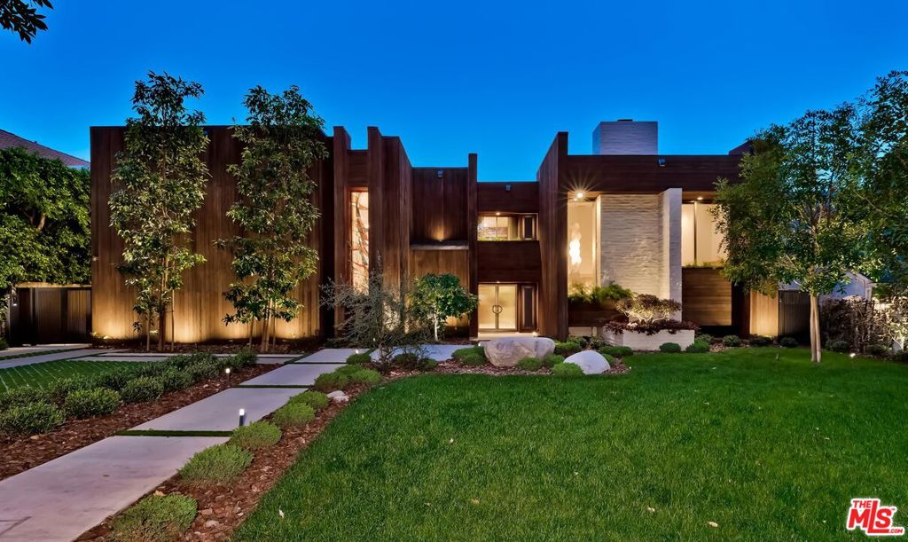 Also for sale at $13,995,000! Amazing opportunity for a long-term furnished lease on this masterful renovation/restoration completed in 2020 of a classic registered Beverly Hills' landmark 2sty Buff and Hensman Architectural Modern estate maintaining the original bold vertically geometric aesthetic of the home. Featuring storefront-type aluminum framed glass doors, redwood clad exteriors, and artistic stained glass, this pristine home is on a wonderfully large 85ft wide lot with a substantive backyard highlighted by lawns, patios, pool/spa, and inviting cabana all complemented by unusual privacy due to mature hedging. From the double-door entry, the open entertainment flow of the home is illustrated by the enormous dining room and dramatic 2sty living room each leading to the spectacular grounds. A fabulous private den/office and loft study area are off of a gallery and bar near the front of the home. Newer and massive dual-island top-quality kitchen and family room combination along with a walk-in pantry are located in the northern wing of the home and open to the grounds as well. There are 4 tremendous bedroom suites upstairs (each with a stunning newer bath) and one guest suite downstairs. Huge primary suite with fireplace, large balcony, and a newer dual-sided bath. Outdoor storage room and a gated 2 car garage. Fabulous and impressive asymmetrical architectural curb appeal on a coveted quiet 600 block moments from the heart of the city. Shown only to highly pre-qualified clients.