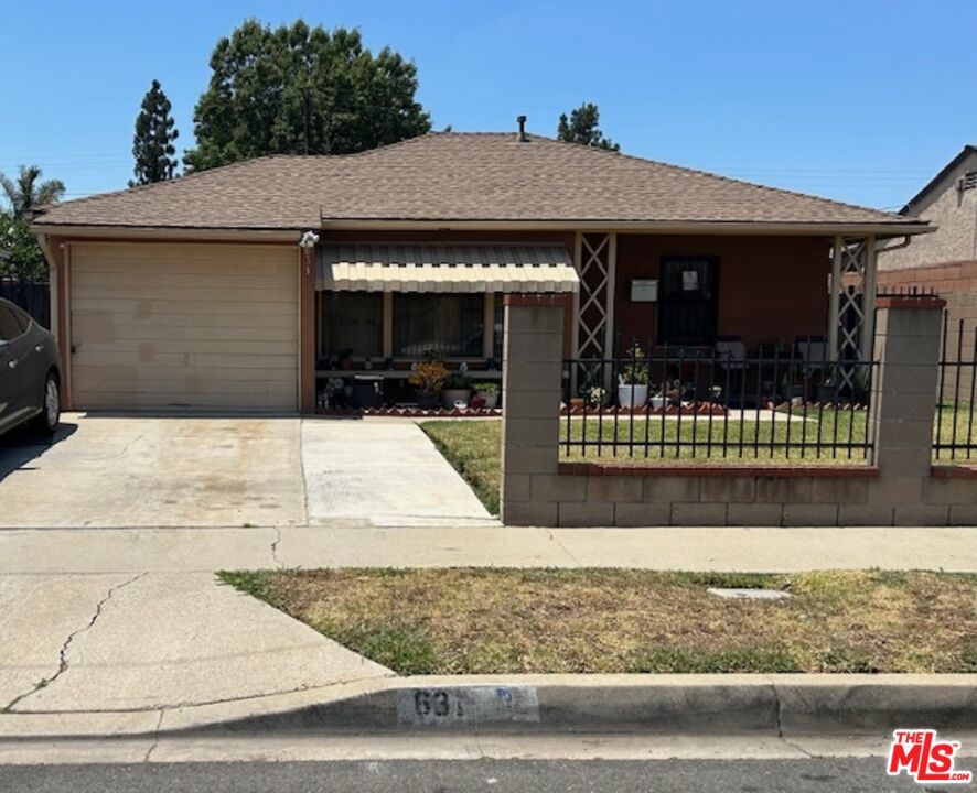 Lovely 3 bedroom 2 bath home in move-in condition just awaiting for a buyer to call it home. This home features a large master suite, an updated kitchen and remodeled baths. The garage has been converted for extra space or it can easily be converted back to it's original use, whereas the door is still attached. Sit outside in the well manicured backyard under the pergola for lunch or take advantage of the warm summer evenings by dining outdoors. The backyard has an orange tree and is also great for entertaining large parties, also large enough to extend the current home or build an ADU for additional income.