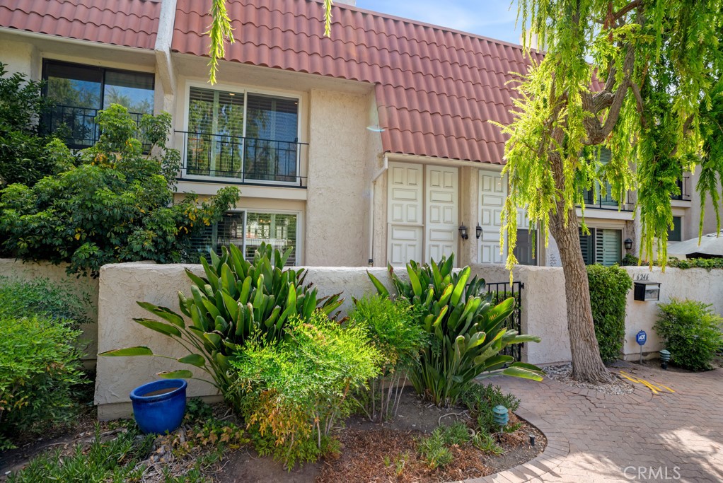 Stylish, remodeled, poolfront townhome with dual primary suites and elegant finishes. Step into refined living with this beautiful 1888sqft. pool-facing townhome, offering the perfect blend of luxury, space, and modern convenience. Boasting two expansive primary bedrooms, three bathrooms, and direct-access two-car garage, this residence is thoughtfully crafted for elevated everyday living and entertaining. The heart of the home is a chef’s dream kitchen, featuring granite countertops, massive island, top-of-the-line Viking range, and a full suite of premium appliances—including a separate full-size freezer—all framed by custom white cabinetry and sleek finishes. Rich luxury vinyl plank flooring flows throughout the open-concept main level, where you'll also find a stylish guest bathroom and direct access to the enclosed patio. Upstairs, both primary suites offer incredible space and privacy. One overlooks the newly renovated resort-style pool and includes a large walk-in closet and adjacent bath. The main primary suite is a true retreat, with multiple closets, a generous sitting area, and a stunning renovated en-suite bathroom featuring a soaking tub, separate glass-enclosed shower, heated towel rack and designer touches. With sophisticated updates, an unbeatable interior location in the community and just steps from the pool, this home is a standout opportunity for those seeking style and quiet comfort.