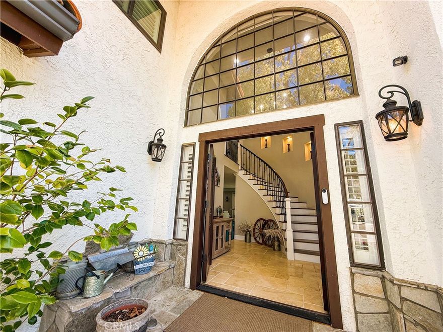 This beautifully remodeled home in a coveted equestrian neighborhood sits on an amazing over 20,000 sq ft flat lot with endless possibilities! At almost 2400 sq ft this home has been completely upgraded and remodeled with a beautiful open floor plan. You are welcomed with an 18 foot high ceiling grand entryway and staircase. Natural light fills the home through the fabulous front windows. Plantation shutters finish the windows through out the home. 
Vaulted ceilings draw you into the family room and stunning entertainers kitchen. This kitchen welcomes you with a massive eat-in island with quartz counter tops, stainless steel appliances with dual ovens, pot filler above the beautiful gas range stove, as well as a stunning built-in bar and wine fridge. 
Dual sliding doors open to the beautiful covered patio with built-in ceiling fans, lighting and a gas fireplace, perfect for outdoor entertaining or cozy summer nights next to the relaxing custom built pond. Wide RV access on the side expands to the massive yard with lush green grass, magnificent  tree and so much space to make your dreams come true!
Back inside, the custom-built spiral staircase takes you to the master retreat with an ensuite that lacks nothing with its stunning soaking tub, separate walk in shower, and his & hers closets. Last but certainly not least, French doors open up to your private deck above the patio where you can enjoy your coffee or wind down for the evening and enjoy the view! 
This home is a must see!