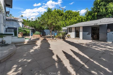 Photo of 1434 N Genesee Avenue, Los Angeles, CA 90046 (MLS # IV26033898)