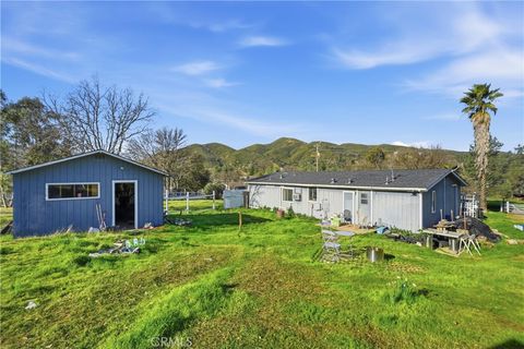 Photo of 16553 Comanche Trail Trl, Clearlake Oaks, CA 95423 (MLS # LC26001836)