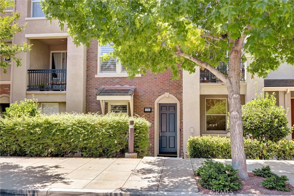 Life is peaceful in the heart of San Marcos! This rare listing in Village Square at San Elijo Hills overlooks San Elijo Park and truly shines with a walkable, town-center lifestyle.
At approximately 1,480 sq ft, this immaculate tri-level townhome delivers easy living, with the park, the iconic San Elijo fountain, shopping, coffee, and dining just across the street. The entry level features garage access, front access, plus a flexible den/office that can be used as a third bedroom, with a charming brick accent wall that adds warmth and character.
The main level boasts a modern open layout that connects the living, kitchen, and dining areas to the balcony. The sizable kitchen is designed for everyday cooking and entertaining, offering abundant storage, granite counters, refrigerator, a large island with breakfast bar, crown molding, and custom lighting. Upgraded plantation shutters on every window add style and energy efficiency.
Warm, sustainable bamboo flooring flows through the lower and main living areas, travertine stone elevates the 2.5 baths and hardwood floors on the 3rd floor.
Upstairs, are two comfortably sized bedrooms, with unobstructed views of San Elijo Park and the surrounding San Marcos hills out every window, 2 full baths and full hallway laundry. The primary suite includes a walk-in closet with mirror doors and a dual-sink bath with a separate toilet room and tub/shower. The secondary bedroom is bright and airy with a large mirrored closet. Practical perks include central A/C, full-size laundry with the newer washer and dryer included. A private, attached two-car tandem garage with epoxy floors and extra storage is located on the lower level.
Village Square at San Elijo Hills places you moments from miles of trails, parks, and community events. Commuter friendly near the I-15, 78, and I-5 freeways and centrally located, you’ll be minutes to Carlsbad, Encinitas, and everything San Marcos offers. Schedule your viewing today of this clean, stylish home in a prime village location that’s ready for you to call home.