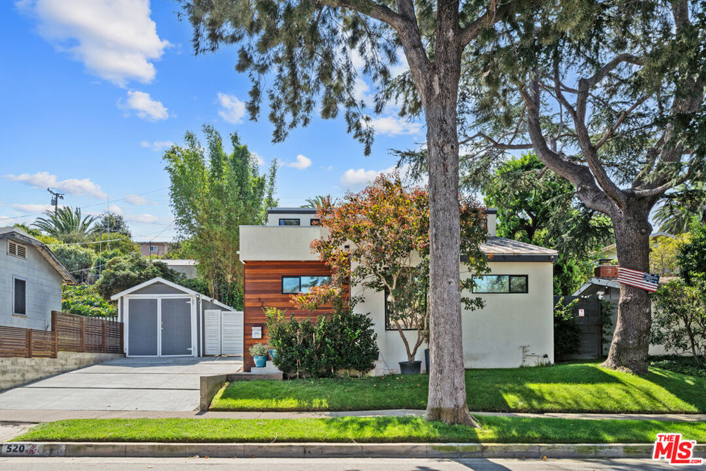 Tucked away on a picturesque street lined with towering pine trees, this designer home offers the perfect blend of modern upgrades and community charm. Behind its striking architectural design, the home features a thoughtfully curated layout with 2 bedrooms, 2 baths, and over 1,400 sq ft of living space. The open living spaces are drenched in natural light and flow seamlessly to outdoor areas ideal for entertaining. You'll also enjoy high-end upgrades including a Ring security system, a custom-built solarium that brings the outdoors in, and a private sauna for ultimate relaxation. Bonus shed included that can serve as storage or an at-home gym. Beyond the home itself, Ellis Ave is a warm and inviting neighborhood known for its strong community spirit and the much-anticipated annual block party a true celebration of connection and belonging. This unique rental combines designer living with a sense of home, making it a rare find.
