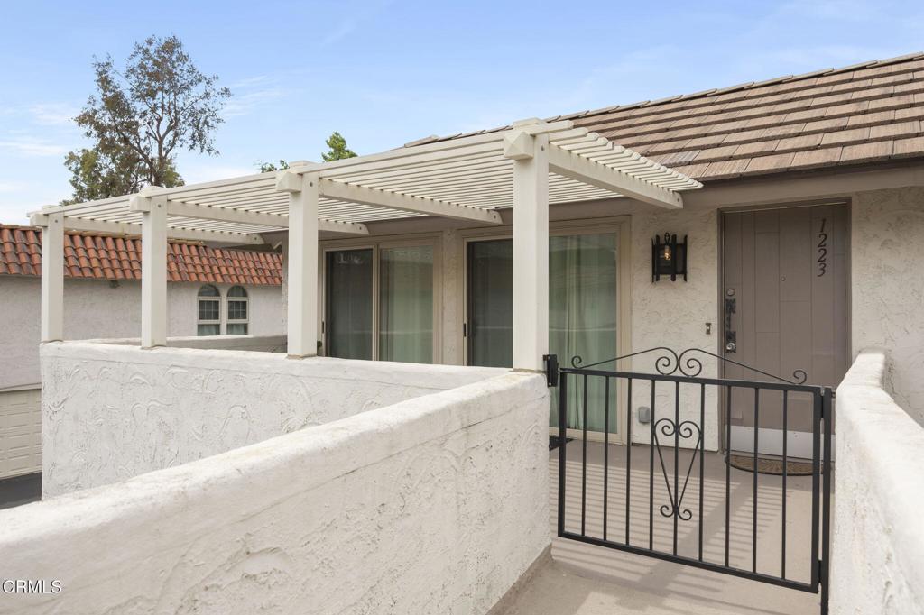 Charming Westlake Condo in Prime Village Green Location!Welcome to this beautifully updated 2-bedroom, 1-bathroom condo located in the highly sought-after Village Green community in stunning Westlake. Just steps away from Westlake Commons, renowned restaurants, a local winery, and scenic walking and biking trails.This location truly offers the best of Westlake living, all within walking distance.Inside, you'll find a spacious primary bedroom with a large walk-in closet, and a fully remodeled bathroom featuring a stylish walk-in shower and modern fixtures. The updated kitchen boasts granite countertops, tile backsplash, and a convenient stackable washer/dryer. Other highlights include a newer furnace, a 2-year-old A/C unit, updated sliding patio doors, and windows with a lifetime warranty.Enjoy your mornings or evenings on the large patio facing the serene hills a perfect spot to unwind. The home includes a covered garage with a new garage door opener, a reserved parking space next to the garage, and plenty of guest parking.The Village Green community offers fantastic HOA amenities includes 2 heated pools, spa, basketball courts, shuffle board court and well-maintained common areas. HOA covers interior and exterior pest treatment, water and trash. Don't miss this opportunity to own a move-in ready home in one of Westlake's most desirable neighborhoods!