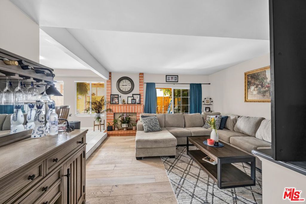 Discover this charming 3-bedroom, 3-bathroom condo nestled in the heart of Panorama City. Located in a secure, well-maintained complex, this spacious home offers the perfect balance of comfort and convenience. Step inside to find a bright, open-concept living area ideal for both relaxing and entertaining. The modern kitchen comes equipped with sleek stainless steel appliances, ample cabinetry, and a layout perfect for the home chef. Enjoy indoor-outdoor living with a large private backyard. The primary bedroom provides a spacious room completed with an en-suite bathroom and a walk-in closet. The home includes central air conditioning, in-unit laundry on the second floor, two space parking garage and access to the well maintained community pool. Whether you're a first-time buyer, upsizing, or looking for a smart investment opportunity, this home checks all the boxes.