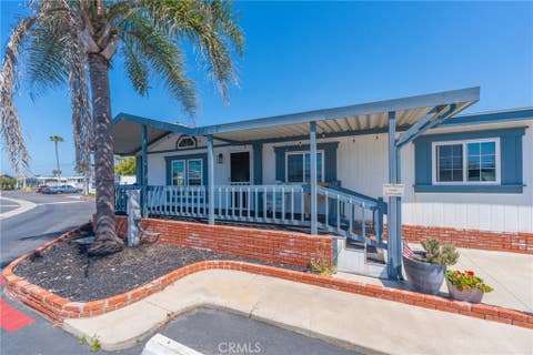 Photo of 21851 Newland St ST #266, Huntington Beach, CA 92646 (MLS # OC26098016)