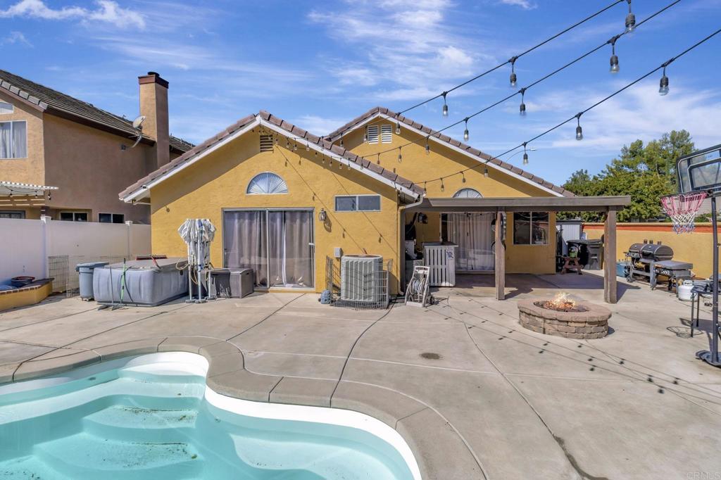 Stop your scrolling! Welcome home to this amazing and inviting 3 bedroom, 2 bath pool home perfectly situated on a corner lot near a beautiful park, top conveniences and easy freeway access—perfect for busy on the go! Step inside to enjoy vaulted ceilings, a large kitchen, lots of natural light, a large master suite to unwind, and a cozy fireplace in the living room where everyone can gather and make memories. The private backyard with a sparkling pool is ready for summer fun, birthday parties, and weekends at home! Plenty of room to stretch out on this corner lot home!!! Murrieta Park within walking distance. Comfort, convenience and entertaining space — all in one amazing home!