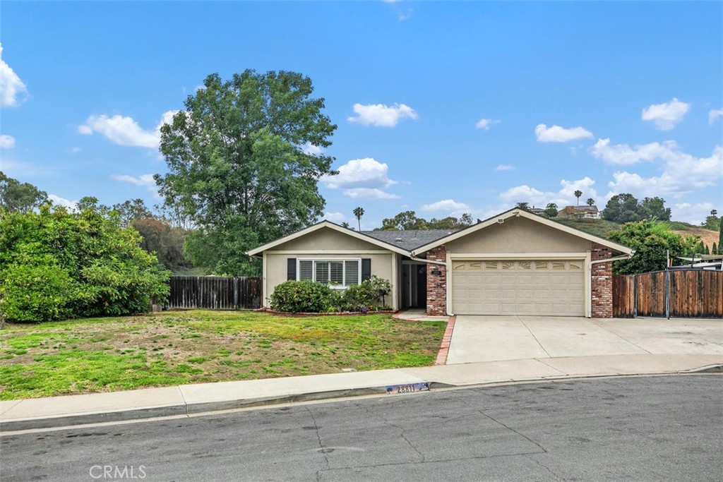 This charming single-story home in Laguna Niguel features three spacious bedrooms and two full bathrooms, making it suitable for a variety of living arrangements. The property is located at the end of a quiet cul-de-sac, providing a peaceful environment and minimal traffic. Inside, the open floor plan creates a warm and welcoming atmosphere, with natural light flowing through the windows. The kitchen is equipped with modern appliances and ample counter space, ideal for cooking and entertaining. The bedrooms are generously sized, and the primary suite includes an en-suite bathroom for added privacy, along with convenient access to the backyard through a private french door. This feature allows for easy outdoor enjoyment directly from the primary suite. A notable feature of this home is the RV access, perfect for parking a boat or motorhome, offering added convenience for outdoor enthusiasts. Outside, the backyard is perfect for relaxation and gatherings, featuring a patio area, and a small view that enhances the outdoor experience. This home offers comfort and convenience in the beautiful community of Laguna Niguel, making it a great option for those seeking a welcoming place to live.