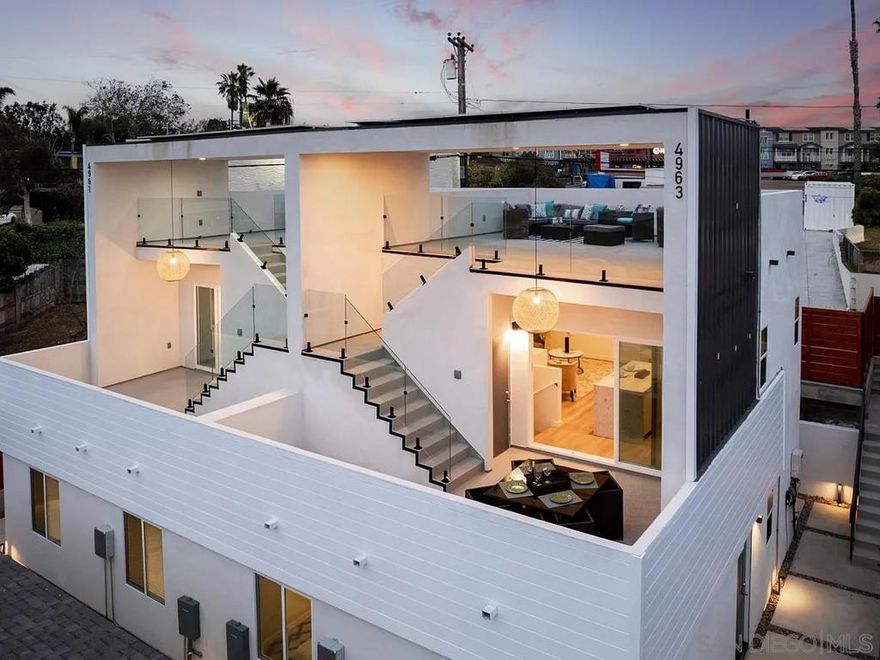Exceptional 4-Unit Investment Opportunity with Bay Views: 4957-63 Jumano Ave in Clairemont.  Bridgepoint Realty, Inc. is pleased to present this Turnkey four-unit property in the heart of Clairemont. The offering includes two fully remodeled 2BD/1BA residences and two tri level new-construction 3BD/2.5BA ADUs with glass-railing rooftop decks (~600 sq. ft. deck). Built with exceptional craftsmanship and premium materials, the property delivers high-quality construction and modern design throughout creating a unique offering. Units embrace high quality designs featuring contemporary kitchens, designer bathrooms, in-unit laundry, solar power, and private outdoor spaces.  The rooftop decks of the ADUs showcase sweeping Mission Bay views. Each residence enjoys dedicated on-site parking and private areas, adding to tenant appeal and long-term value.  Investors will appreciate the value-add potential of the property’s two high-ceiling garages, presenting a rare opportunity to convert into modern loft-style units or creative studios (buyer to verify).  Centrally located near Tecolote Canyon Golf Course, Mission Bay, and major freeways, residents enjoy easy access across San Diego. The property is also walkable to local restaurants and entertainment, blending convenience with lifestyle appeal.  4957-63 Jumano Ave stands as a turnkey, high-quality asset with strong rental income today and room for tomorrow’s growth, ideal for investors seeking lasting value in one of San Diego’s most desirable neighborhoods.