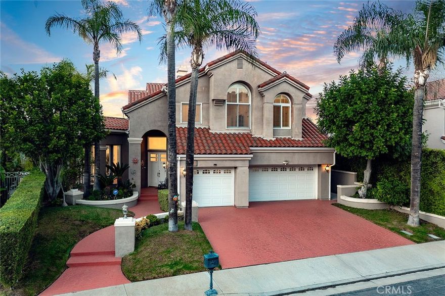 Discover this stunning guard-gated Mediterranean home with panoramic views, perfectly situated on a flat cul-de-sac in one of Calabasas’ most sought-after communities. Offering 5 spacious bedrooms and 4 baths, this residence blends comfort, elegance, and functionality in a bright, open floor plan. As you enter, soaring ceilings and abundant natural light create a grand first impression. The home features a formal living and dining room ideal for entertaining, while the chef’s kitchen—equipped with premium appliances—flows seamlessly into a warm, inviting family space with direct access to the backyard. The first floor includes a convenient bedroom - perfect for a home office, while upstairs you’ll find four additional bedrooms, including a luxurious primary suite with a cozy fireplace, spa-inspired ensuite, and generous closet space. Outdoors, enjoy breathtaking panoramic views of the San Fernando Valley. The backyard is designed for relaxation and entertaining, boasting a gated pool and spa, built-in BBQ, open patio, and lush landscaping. Additional highlights include a three-car garage with dual Tesla charging stations, ample storage, and meticulous curb appeal. This is more than a home—it’s a lifestyle. With access to top-rated schools, premier shopping, and the vibrant Calabasas community, this property offers the perfect blend of luxury and everyday convenience.