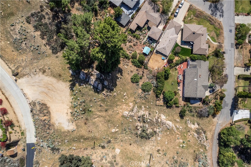 Discover a rare chance to own over an acre of prime land in the sought-after Belvedere Heights neighborhood! Perched on a scenic hillside in the heart of the University area, this exceptional lot offers sweeping views of the city by day and sparkling lights by night. With dual street access from Galaxie Heights Road and Floral Avenue, the property is ideally positioned near the Box Springs Mountain trails—perfect for nature lovers and outdoor enthusiasts. Just minutes from shopping, dining, and the University of California, Riverside, this location blends serenity with convenience. Utilities are easily accessible, making it even easier to bring your dream home to life. Don’t let this incredible opportunity pass you by—come see it for yourself today!