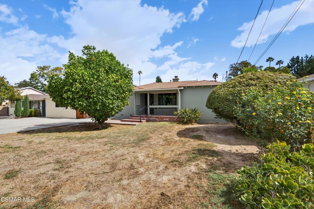 Welcome to this beautifully upgraded Reseda property--recorded as a 2-bedroom, 1-bath, but currently enjoyed as a 3-bedroom, 2-bath home with over 1,450 sq. ft. of living space. The den has been converted into a third bedroom, and the added square footage creates a flexible and comfortable layout. Recent upgrades include fresh interior paint, and new flooring, giving the home a clean and well-maintained feel. The home features a cozy front porch, perfect for your morning coffee, relaxing afternoons, or evening unwinding.The elongated, galley-style kitchen showcases modern espresso-colored cabinets paired with granite countertops, delivering both style and practicality. It's dining area, offers warmth, charm, and everyday functionality. Just off the kitchen is a convenient laundry room with direct access to the backyard, making the layout highly practical for daily living. Enjoy newly renovated bathrooms and a primary suite with a walk-in closet. Room leads out through double french doors to the backyard. The backyard is perfect for summer gatherings, featuring a nicely built deck ideal for outdoor dining, BBQs, and entertaining. The property includes a detached one-car garage, used for parking, possible storage, or future ADU potential. The home also features great A/C, providing comfort year-round. Property located in a looked-for Reseda neighborhood, near shopping, dining, schools. This home delivers value, comfort, and versatility all in one.