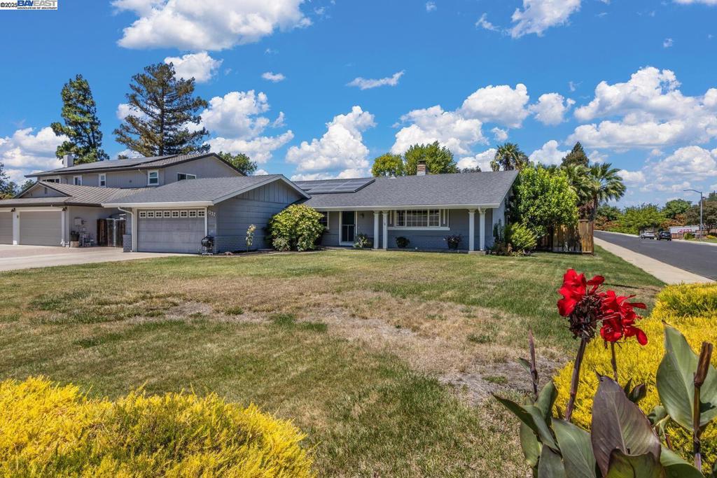 Open House Sunday July 27 from 1-4pm. Welcome to Shadowbrook! Located on a spacious 10,663 sq. ft. corner lot, this beautifully upgraded single-story home offers 1,728 sq. ft. of living space. With over $200K in upgrades, enjoy features like owned solar, central heat & AC, dual-pane windows, hardwood floors, six-panel doors, updated baseboards, and a custom fireplace mantel. The extended, remodeled kitchen boasts cherry cabinets, granite counters, tile backsplash, a large island, Wolf 5-burner gas stove, and stainless appliances. Bathrooms are fully renovated, and recessed lighting brightens every room. There are tool sheds, automatic sprinklers, garden beds, and possible RV access. Top-rated schools and Independence Park nearby!