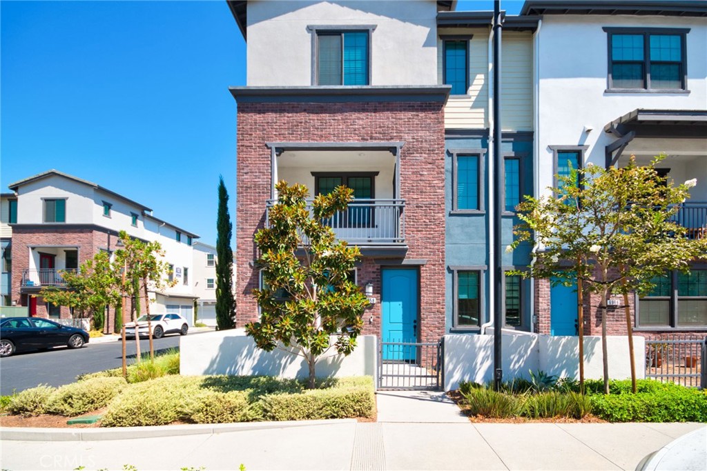 Experience modern living in this newly built 4-Bedroom END UNIT Townhome located in the gated Magnolia Square Community. The smart floor plan offers a private main-level bedroom with ensuite bath, an open-concept second floor with a gourmet kitchen, spacious eat-in island, walk-in pantry, dining and living areas that extend to a private balcony, and an upper level featuring a luxurious primary suite with large walk-in closet, two additional bedrooms, a full bath, and a convenient laundry room. Additional highlights include a attached two car garage with direct access and community amenities such as BBQ areas, outdoor picnic area, a playground, and ample guest parking. Ideally situated near the 5 and 91 freeways, The Source OC Mall, restaurants, grocery stores, and within walking distance to Buena Park High School, this home offers the ideal blend of comfort, convenience, and contemporary elegance.
