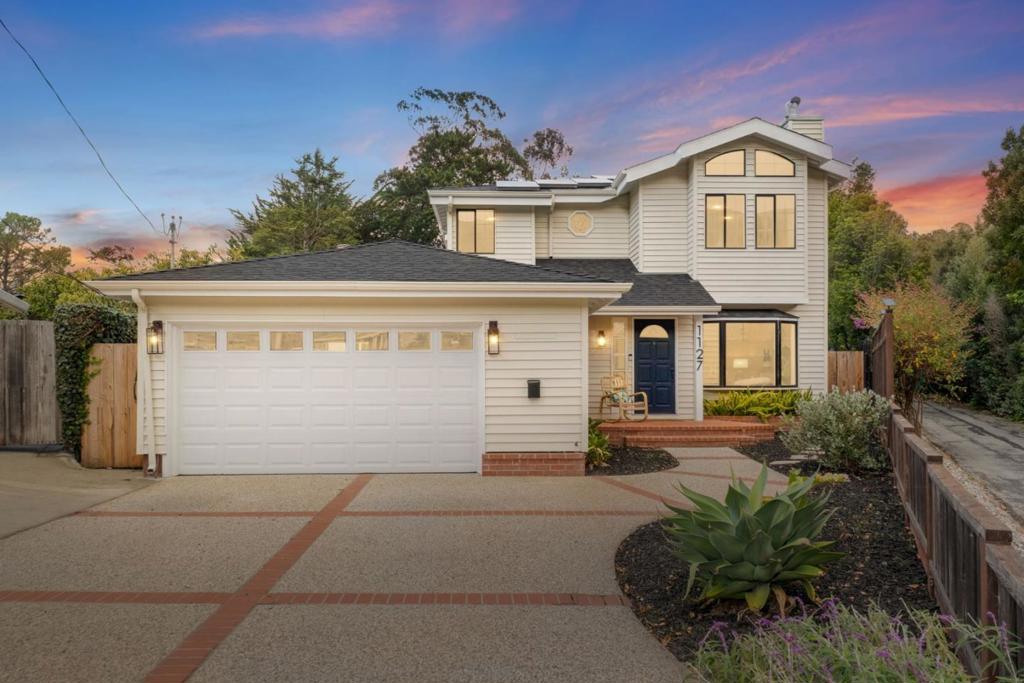 Just five minutes from the beach, 1127 Galvez Drive perfectly captures Pacificas relaxed coastal vibe with a fresh, modern finish. Fully remodeled from top to bottom, this home blends comfort and style with a bright, open layout, sleek finishes, and a soothing coastal palette. The kitchen is a show piece modern quartz countertops, custom cabinetry, and stainless steel appliances make cooking and entertaining effortless. Indoor-outdoor living shines here, with multiple spaces to unwind: a cozy courtyard off the formal dining room, a dining patio perfect for weekends, a tranquil back deck, and a private deck off the primary suite for quiet mornings or watching the sun go down. Step outside and you're near lovely hiking trails, surrounded by nature and fresh ocean air. The neighborhood is family-oriented and fun! Every 4th of July, the community gathers for the classic car parade and celebration at Frontierland Park, a beloved local tradition. Stylish, comfortable, and connected to the best of Pacifica living, 1127 Galvez Drive feels like home.