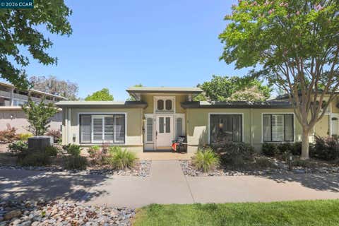 Photo of 1209 Oakmont Dr #6 DR, Walnut Creek, CA 94595 (MLS # 41138269)