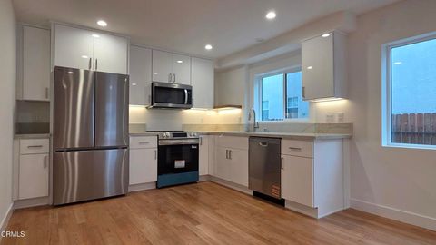 Photo of 917 N Ridgewood Place, Los Angeles, CA 90038 (MLS # P1-26678)