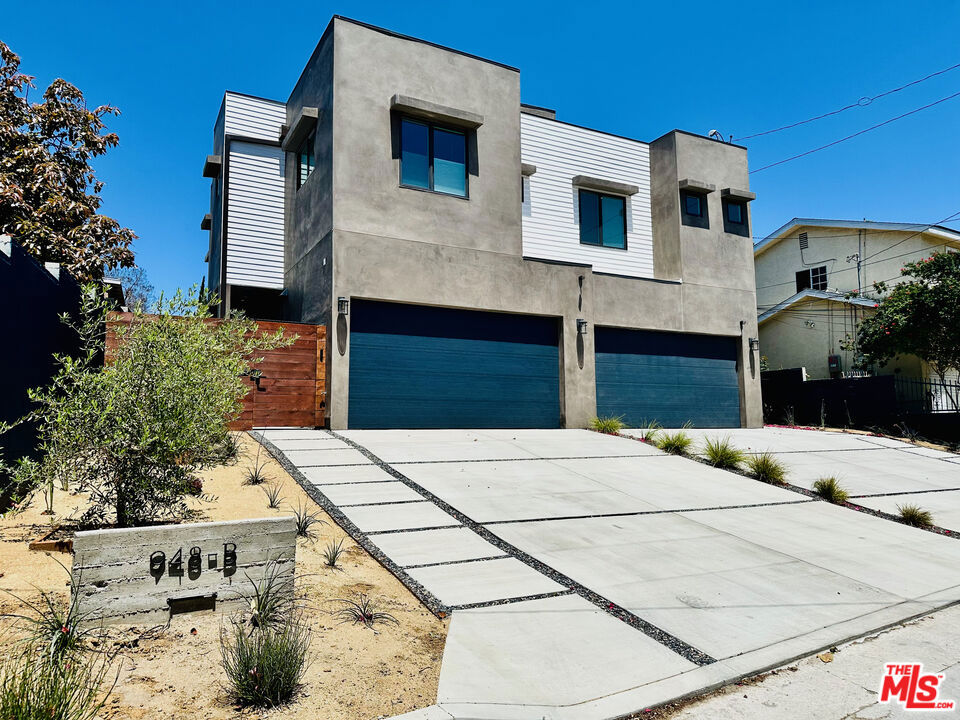 Brand new construction, incredible urban hideaway on private alley (not open to through traffic). Fully furnished and equipped, absolute move in condition. Enjoy the modern open layout and 10' high ceilings throughout, while enjoying all of the cozy comforts of a wonderfully designed interior space. This town home includes a private gated yard, 2 car private driveway parking and walking distance from Vincent Chase Park and the "K" line Fairlawn light rail station with future direct access to LAX. The K line can access Culver City, USC, Santa Monica and Downtown LA (with 1 transfer). The unit has upstairs and downstairs separately zoned HVAC, fully equipped kitchen and all bedrooms are equipped with en-suite bathrooms plus powder room on the first floor. This is a genuine urban hideway, very quiet pocket in a very friendly neighborhood.