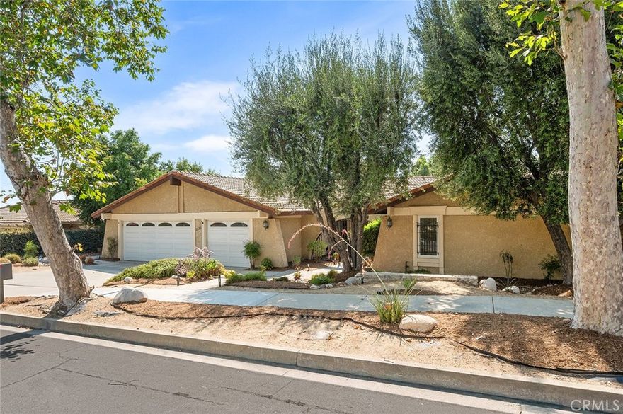 Step into this exquisite single-story home nestled in the charming city of Claremont, CA, where every detail exudes elegance and sophistication. This 4-bedroom, 2-bathroom residence sits on a sprawling 11,215 square foot lot, offering a serene retreat from the hustle and bustle of everyday life.



As you enter, you are greeted by a spacious living room adorned with a cozy fireplace, perfect for relaxing evenings. The formal dining room features a slider that opens to the expansive backyard, creating a seamless indoor-outdoor living experience. The family room overlooks the remodeled kitchen, boasting custom cherry wood cabinets, luxurious Taj Mahal quartzite countertops, and top-of-the-line Whirlpool appliances.



The home is filled with custom upgrades, including LVT wood-look flooring, a Tiffany-style chandelier, and custom alder wood cabinetry in the hall and main bath. The bathrooms showcase curbless tiled showers with temperature-controlled flow and water-conserving fixtures, adding a touch of modern luxury.



Outside, the xeriscape front yard is a masterpiece of landscaping design, complete with drip irrigation and a clever rainwater collection system. An Alumawood pergola extends off the patio, providing the perfect spot for outdoor dining and relaxation.



Located near prestigious schools, scenic hiking trails, and convenient freeway access, this home offers the best of Claremont living. Immerse yourself in the vibrant community with its farmer's markets, local shops, and charming eateries, all while enjoying breathtaking views of the foothills and mountains.



This home is truly move-in ready, offering a perfect blend of comfort and style. Don't miss out on this amazing opportunity to make this stunning property your own and experience the best that Claremont has to offer.