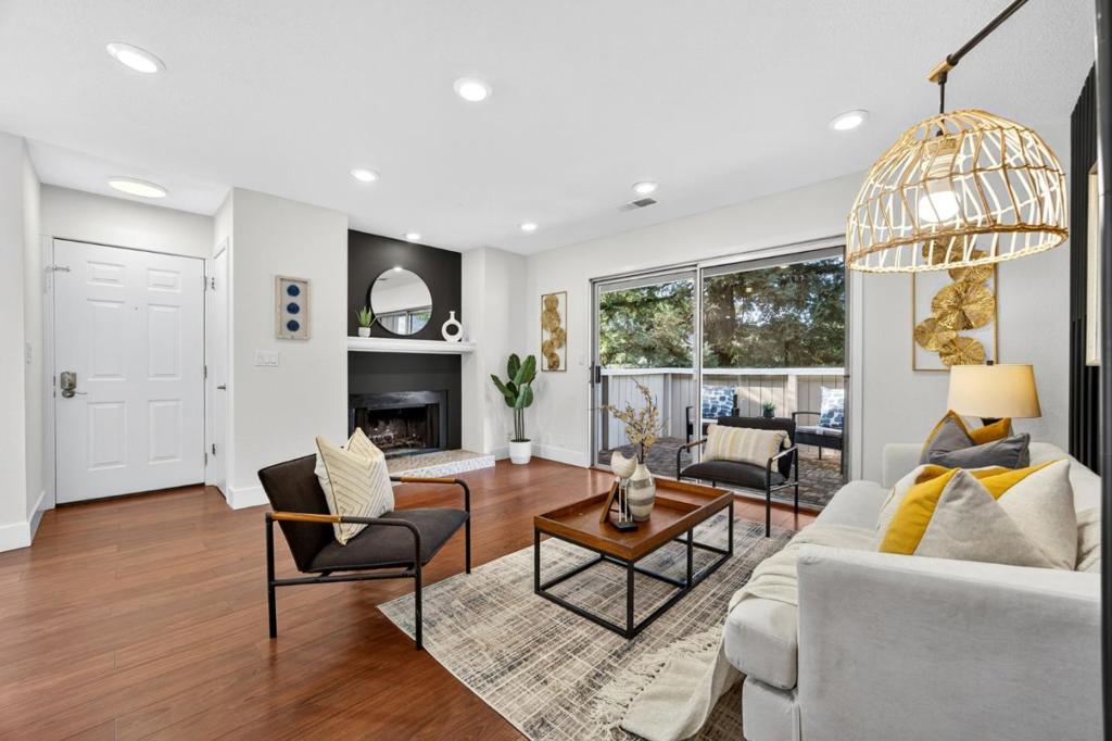 Welcome to 5506 Sean Circle, Unit 112 - a beautifully updated residence in the highly sought-after Windsong community. This home offers 2 bedrooms, 1 bathroom, and approximately 997 sq ft of thoughtfully designed living space, enhanced with luxury upgrades throughout. Step inside to a bright and spacious living room featuring a cozy fireplace, an accent wall, and a sliding glass door that opens to your private patio - the perfect spot to enjoy morning coffee or warm summer evenings. The open-concept layout flows seamlessly into the dining area and remodeled kitchen, complete with sleek cabinetry, updated countertops, and modern stainless-steel appliances. Additional features include fresh interior paint, recessed lighting, and new carpet in both bedrooms. Residents enjoy community amenities such as a sparkling pool and relaxing spa. The home also comes with two assigned parking spaces - one covered carport space with extra storage and one uncovered spot. HOA dues conveniently cover garbage, water, and sewer. Ideally located in the heart of Silicon Valley, with easy access to shopping, dining, major commute routes, leading tech companies, and Martial Cottle Park providing access to sprawling open space with trails. Don't miss your chance to call this Windsong gem your own!