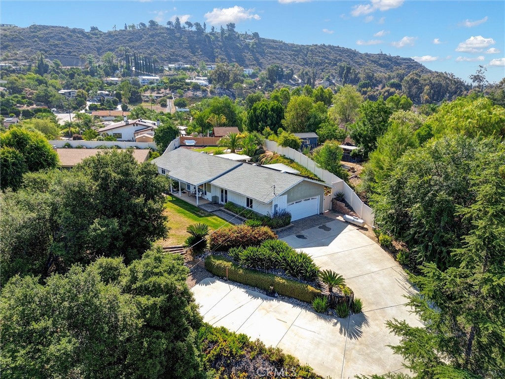 HILLTOP RETREAT WITH PANORAMIC VIEWS, MODERN UPGRADES & OUTDOOR OASIS!!! Welcome to your private sanctuary! This beautifully updated 3 bedroom 2 bath home sits on a serene half-acre lot, offering breathtaking PANORAMIC MOUNTAIN VIEWS and tranquil privacy, yet just minutes from city conveniences. Enjoy peace of mind with a NEWER ROOF (installed in 2020) and FULLY PAID SOLAR, along with tasteful upgrades all throughout. The open concept layout features vaulted ceilings, skylights, and elegant tile flooring paired with crown molding and new dual pane windows for natural light and energy efficiency. The REMODELED KITCHEN is a Chef's dream, boasting custom quartz countertops, a stylish glass tile backsplash, and modern fixtures and finishes. Bathrooms are equally updated with designer touches and attention to detail. Step outside into your custom outdoor covered retreat, perfect for hosting. Cook like a pro with the plumbed-in PREMIUM BULL OUTLAW GRILL, relax by the fire pit, or enjoy the mature fruit trees and peaceful views. Additional highlights include: 300 sqft. bonus addition (office, laundry, mudroom with custom built-ins). Finished garage with epoxy floors - RV PARKING WITH POWER & WATER HOOKUPS!!!! Tankless water heater and abundant storage throughout. This home offers the best of country living, minutes from local favorites like Key Creek Winery, Sage Hill Ranch, and the Daley Ranch hiking trails.
Don't miss this rare opportunity to own a turn-key home in a coveted location with room to roam. Schedule your private tour today and experience the lifestyle of which you've been dreaming your entire adult life!!!!!!!!!!!!!!!!!!!!!!!!!