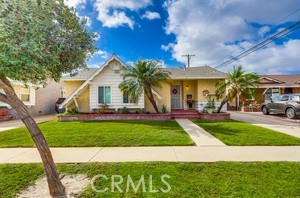 Welcome to this beautifully turn-key ready 3-bedroom, 2-bath home offering 1,402 sq. ft. of bright and comfortable living space in the highly sought-after East Lakewood area, within the award-winning ABC School District. This light-filled home features dual-pane windows, recessed lighting, and elegant wood flooring throughout the living, dining, and kitchen areas. The kitchen includes granite countertops, dishwasher and stove that lead seamlessly into the family room with the cabinets. The spacious living room features a warm, inviting fireplace—perfect for relaxing evenings. The large primary suite easily accommodates a king-sized bed and includes its own private bathroom. Each additional bedroom offers generous space and closet storage. Enjoy outdoor living in the cozy private backyard —ideal for entertaining or weekend BBQs. Conveniently located near Cerritos Mall, excellent schools, restaurants, and with easy access to the 605 & 91 freeways. Perfect for first-time buyers or investors seeking a well-maintained property in a prime location.