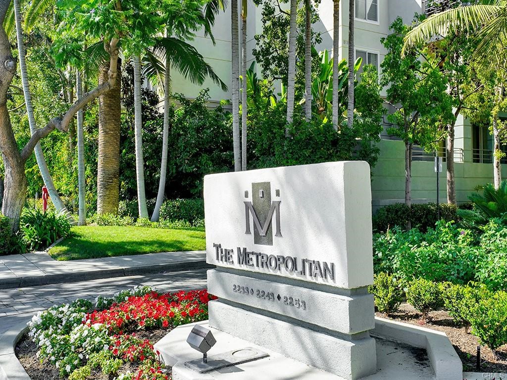 Beautiful Penthouse , Furnished One Bedroom Condo with Den or Office in Guard Gated Complex named, Metropolitan. It is located in Top  floor of Four Story Building. Light and Bright with High Ceilings . Owner Spent Thousands of Dollars to Upgrade this Unit . Kitchen with Tile Floor , Granite Counter Tops , Stainless Steel Appliances , Recessed Lights  and Custom Cabinets open to Dining . Living Room with Plush Carpet , Two Sided  Fireplace has access to Balcony thru a French Door.  Main Bathroom comes with Dual Sinks , Walk in Shower , Toilet with Cabinet and Large Bath Tub.  Bedroom with Walk in Closet , Recessed Lights , Plush Carpet has Access to Patio where you can Sit and Enjoy the the time with Family and Friends. Den or office is paved with nice tile for more comfort and easier movement.  Condo is equipped with Air Condition System. All Windows are Sound Proof with Dual Paned Glasses .Two Parking Spaces in Subterranean Garage is Assigned for this Condo in First Level. Guest Parking is available in Complex. From the moment you enter the complex , you feel the Resort Style Living in a Professionally Managed Association with Club House, Pool , Spa, Gym . Condo is  FULLY FURNISHED  Just Bring your Suit Case with Your Clothes ! Can be rented Furnished or Unfurnished. Owner pays for Water, Trash and Building Facilities Monthly Charge . Ready to move in December 1st , 2025