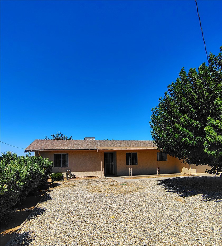 PRIDE OF OWNERSHIP!! Situated in the charming neighborhood of Hesperia, this delightful residence offers a single-story layout with 2 bedrooms, 2 baths, 2 car garage and a generous living space spanning 1,098 sq ft. The property rests on a substantial flat 0.58 acre lot and plenty of room to add an ADU or additional square footage to the home. The property can potentially be zooned as horse property (Buyer and buyer agent to verify.) The back yard is completely fenced with a double -wide side gate that fits any recreational or off-road vehicle and plenty of room to add a swimming pool, additional storage or a barn. Included is a storage bin container converted into a small work shop with electricity.
Centrally located with walking distance to Victor Valley Towne Center, and other shopping amenities including two major bank branches. Only a few minute drive to Victor Valley Community College, Lowes, Home Depot and Apple Valley's Jess Ranch shopping center for a abundance of shopping. Any numerical statements regarding square footage, room dimensions, and/or lot size are approximations only and have not been verified by the Seller or Broker. Broker & brokers agents do not represent or guarantee the accuracy of the sq. ft. bed/bath count, lot size/dimensions, permits, or other info concerning the conditions or features of the property. The buyer is advised to investigate the condition and suitability of all aspects of the property, including but not limited to the forgoing. Buyers and buyers agent to do their own due diligence. Don't wait, put this one at the top of your list to see right away!