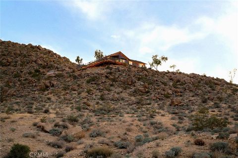 Photo of 71159 Sullivan RD, 29 Palms, CA 92277 (MLS # JT26102595)