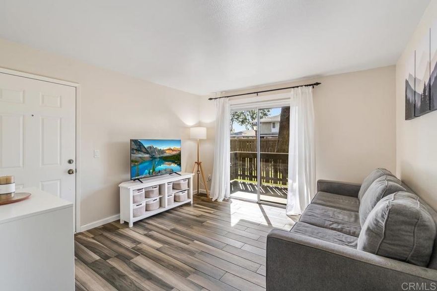 Welcome to your new home in the heart of Escondido! Walkable and close to everything you need. Grab coffee at Dutch Bros, do your shopping at Ralph’s or Vons, and enjoy being just 10 minutes from downtown Escondido.   This beautifully kept condo offers the perfect mix of privacy and convenience. Located on the main floor, this home has a bright and functional layout. Featuring easy-to-clean floors in the main areas and recently updated luxury vinyl flooring (LVP) in the bathroom. You'll enjoy a new stainless steel refrigerator and microwave, new full size washer/dryer, a private patio, and 2 parking spots just steps from the front door along with plenty of guest parking.   Perfect for first time buyers, downsizers, or anyone looking to call this peaceful place home.