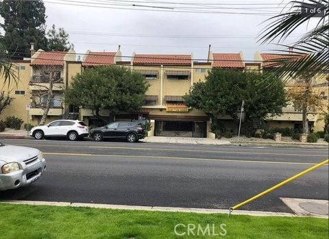 Photo of 12203 Magnolia BLVD #210, Valley Village, CA 91607 (MLS # SR26097745)