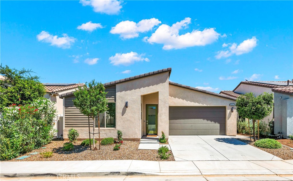 Stylish Living in a Resort-Style 55+ Community of Altis Surrounded by Majestic Mountains
OWNED SOLAR for Energy Efficient Living
Discover modern comfort and vibrant connection in this meticulously updated 3 Bedroom 2 Bathroom home. The inviting layout begins with two versatile bedrooms at the front, perfect for guests, hobbies, or a home office Plus Primary Suite privately located at the back of the home. The heart of the home features an open floor plan with a bright, white kitchen showcasing quartz counters, a walk-in pantry, and recessed lighting, all flowing effortlessly into spacious living and separate dining area warmed by luxury vinyl plank flooring.
Unwind in the serene primary suite, complete with walk-in closet and an elegant en suite bathroom featuring double sinks and quartz countertops—a personal retreat designed for ease and relaxation.
Step outside to a covered patio, ideal for outdoor gatherings or peaceful mornings. Outdoor space is easy to maintain boasting custom pavers and maintenance free plants, and no rear neighbors. With owned solar, this home combines sustainability and savings, letting you live comfortably
Beyond the home, the community elevates everyday living: enjoy a large clubhouse with a gym, onsite masseuse, and an exciting calendar of social events. Stay active with large pool, a lap pool, pickleball courts, BBQ areas, and welcoming lounge spaces perfect for meeting new friends.
This Active 55+ Community is Family Friendly offering access to the pool for family visitors under the age of 18 during certain daytime hours.
Don;t miss the chance to make this your new home !