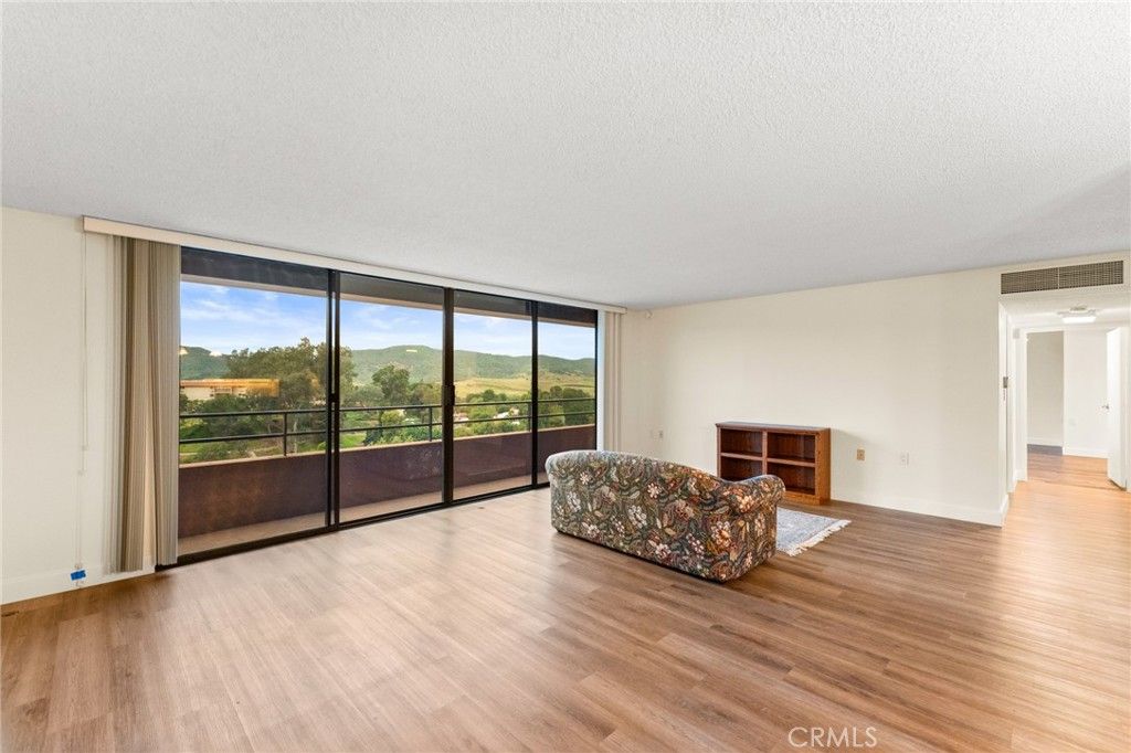 Photo of 24055 Paseo Del Lago #861, Laguna Woods, CA 92637 (MLS # OC26070771)