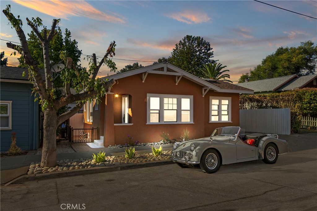 Charming downtown San Luis Obispo home just steps from dining, shops, and events the city has to offer, this is the one you have been waiting for! Fully remodeled 2 bedroom, 1 bath residence blending modern upgrades with classic character. The brand new kitchen is exquisite with beautifully laid herringbone tile, brand new cafe appliances, farmhouse sink, shaker cabinets, granite countertops all flooded with natural light. The brand new kitchen shines with stylish finishes while the updated roof and central heating add peace of mind and comfort. The spa like bathroom features a brand new shower with elegant tile and niche along with built in storage creating the perfect en-suite to bedroom 1 and access from the laundry room with brand new frosted glass barn doors. The laundry room comes equipped with a brand new stacked washer/dryer featuring a sink and countertop perfectly appointed off of the kitchen and access to and from the backyard deck. Bedroom 2 is a showstopper with its vaulted ceilings and exposed wood beams, built in closet with custom window bench, along with a sliding glass door for easy access to the backyard. Outdoors has beautifully brand new landscaping in the front and backyards: featuring pavers, rocks, olive trees, plants and a deck perfect for entertaining and relaxing. Located across from the iconic Sally Loos Cafe, this home offers unbeatable walk-ability and a true taste of the SLO lifestyle.