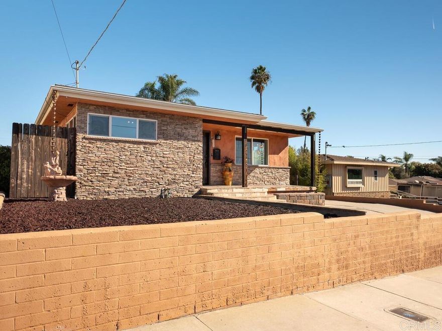 WEST CHULA VISTA'S MOST VERSATILE COMPOUND | Gated Quarter-Acre | Where Business Meets Luxury Living The property every operator searches for but rarely finds: 10,000 square feet of flat, secured land combining completely remodeled residential comfort with infrastructure that builds equity—not expenses. RENOVATED SINGLE-STORY SANCTUARY (1,962 SF): Granite kitchen with center island flows into a fireside family room where life happens naturally. Oversized primary suite with French doors to private backyard—your daily retreat. Spa-inspired bathrooms. Flooded with natural light. Three bedrooms with true separation. Single-story living with all rooms on one level—no interior stairs. A home where thriving families recharge. 8-VEHICLE SECURED COMPOUND: Your private motorized gate opens to three car-covered carport plus a detached garage—room for trucks, RVs, ATVs, trailers, client vehicles, and equipment. Flat terrain means no wasted space. No HOA. No Mello Roos. No restrictions on vehicle-based business operations. This is operational freedom with residential elegance. INCOME-GENERATING DEVELOPMENT POTENTIAL: Zoned for ADU construction—build an 800–1,200 SF unit with $2,400+/mo rental potential. Add detached workshops, studios, or secure storage. Install a resort-style pool. Live in comfort while creating income. Replace $36K/year in off-site storage and yard costs, add $29K in potential ADU income = $65K annual financial impact from one property. STRATEGIC HILLTOP LOCATION: Two minutes to the 805 freeway. Fifteen minutes to downtown San Diego. Walk to award-winning Hilltop Drive Elementary, Hilltop Middle, and Hilltop High School (all rated 7+/10). Surrounded by $800K+ homes appreciating 4–6% annually in one of Chula Vista's most established, family-friendly neighborhoods.  RARE MARKET REALITY: The last gated, flat quarter-acre compound in this area sold quickly. Properties offering this blend of remodeled living, secured parking, and income potential appear once a year—if that. Hesitate, and it becomes someone else's strategic advantage. Your family thrives. Your business scales. Your wealth compounds. All from one address. Secure your operational freedom, residential comfort, and financial upside—all in one move. Schedule your private showing today.