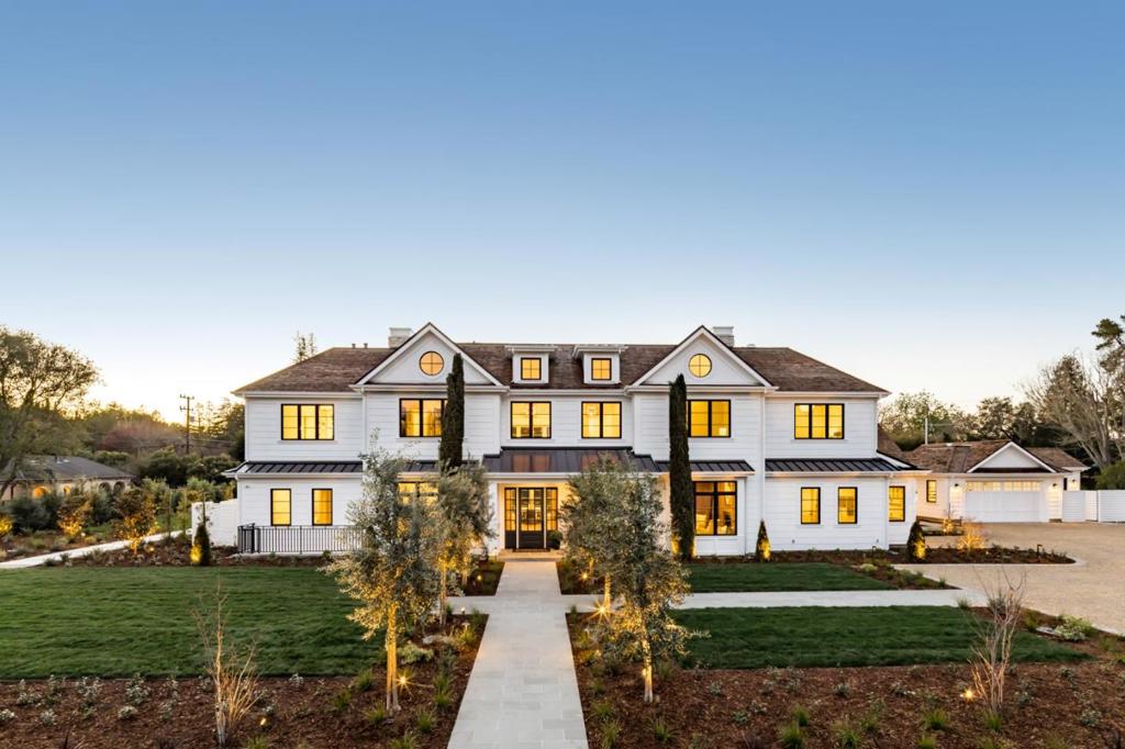 Tucked away on nearly an acre in Atherton, this grand estate offers the ultimate in high-end luxury while providing an unmatched living experience. Completed in 2021, this home offers 8 bedrooms, 9 bathrooms, 2 half-baths, and over 10,500 square feet of refined living space, including a beautiful guest home. Top-of-the-line materials include wide plank wood floors, finishes of both quartz and marble, and dazzling light fixtures. Elegant gathering areas are perfect for both entertaining and everyday living, with multiple rooms opening to the resort-like grounds with a brilliant pool. Luxurious highlights include a gourmet kitchen, a handsome study, theater, fitness/yoga room, and six fireplaces including one outdoors. Plus, Savant smart home automation w/touchpad control puts lighting and climate at the touch of your fingertips. Served by acclaimed Menlo Park public schools, this estate is also convenient to sought-after private schools including Sacred Heart and Menlo School.