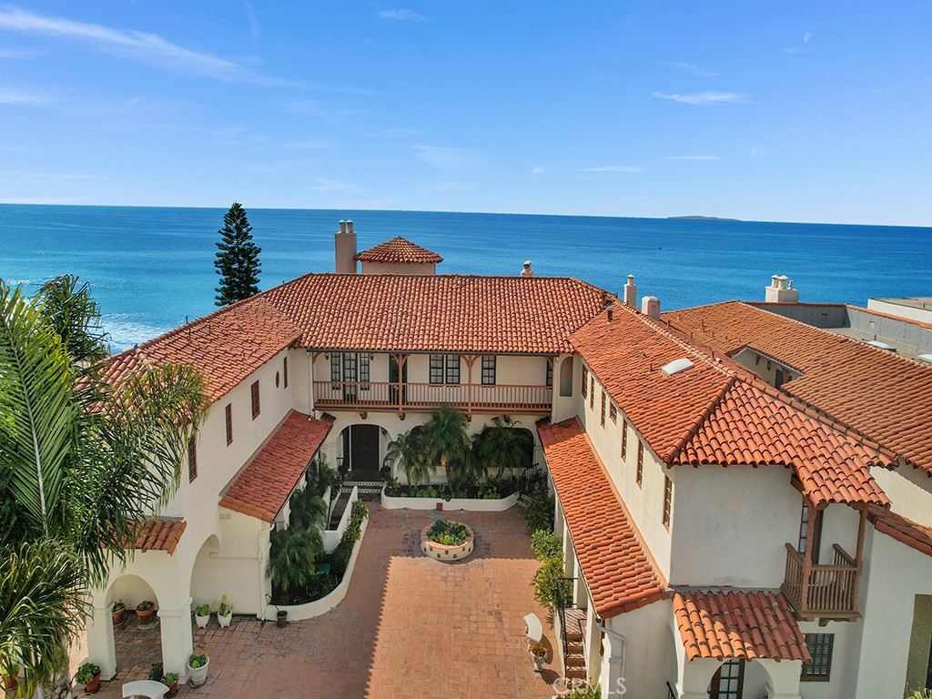Idyllic bluff front luxury oasis! Proudly known as Casa De Marca, this is an iconic Spanish style property with a legendary location and unobstructed ocean views. This SINGLE LEVEL condo, is 3bdr/2.5ba and offers a haven of tranquility with panoramic and white-water ocean views, Catalina Island views and romantic sunset views. This unmatched, sit-down ocean backdrop commands attention the moment you walk through the front door! The main living area effortless flows out on onto a large viewing balcony showcasing these unparalleled ocean views. Hints of Spanish flair placed throughout the residence including terracotta tile flooring and arched entry ways. Additional highlights include an indoor laundry room, a walk-in closet, and a cozy fireplace. Complete with two assigned parking spaces in the gated underground parking garage and storage cabinets. The community amenities include a large grass area, cliff side Jacuzzi and an incredible observation deck that overlooks the beach. Perfectly located next door to Calafia Beach Park which has direct access to San Clemente State Park and the San Clemente Beach Trail. This is Southwest San Clemente living at its finest!