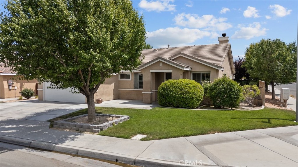 Welcome to this beautifully maintained single-story home in a desirable Lancaster neighborhood. Offering 4 spacious bedrooms, 2 bathrooms, and approximately 1,880 square feet of well-designed living space, this property combines comfort, style, and convenience.
Inside, the home features an open floor plan with abundant natural light, a cozy fireplace in the main living area, and a functional kitchen with generous cabinetry and counter space—perfect for everyday living and entertaining. The private primary suite offers a peaceful retreat with an ensuite bath and ample closet space, while the additional bedrooms are well-sized for family, guests, or home office use.
Enjoy the curb appeal of a neatly landscaped front yard, a large porch for relaxing evenings, a fully landscaped large backyard, including a patio and patio cover. Also. an attached two-car garage.