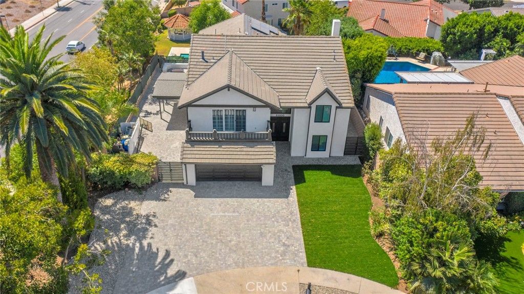 Photo of 20500 Blairmoore Street, Chatsworth, CA 91311 (MLS # SR25224496)
